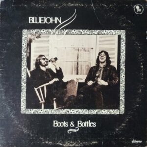 BLUEJOHN (THROWER - SPILLANE - DRENDALL) - BOOTS & BOTTLES - - Image 1